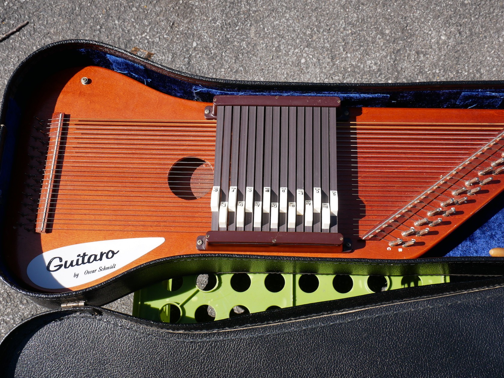 Showing the instrument in the custom velour-lined case.
